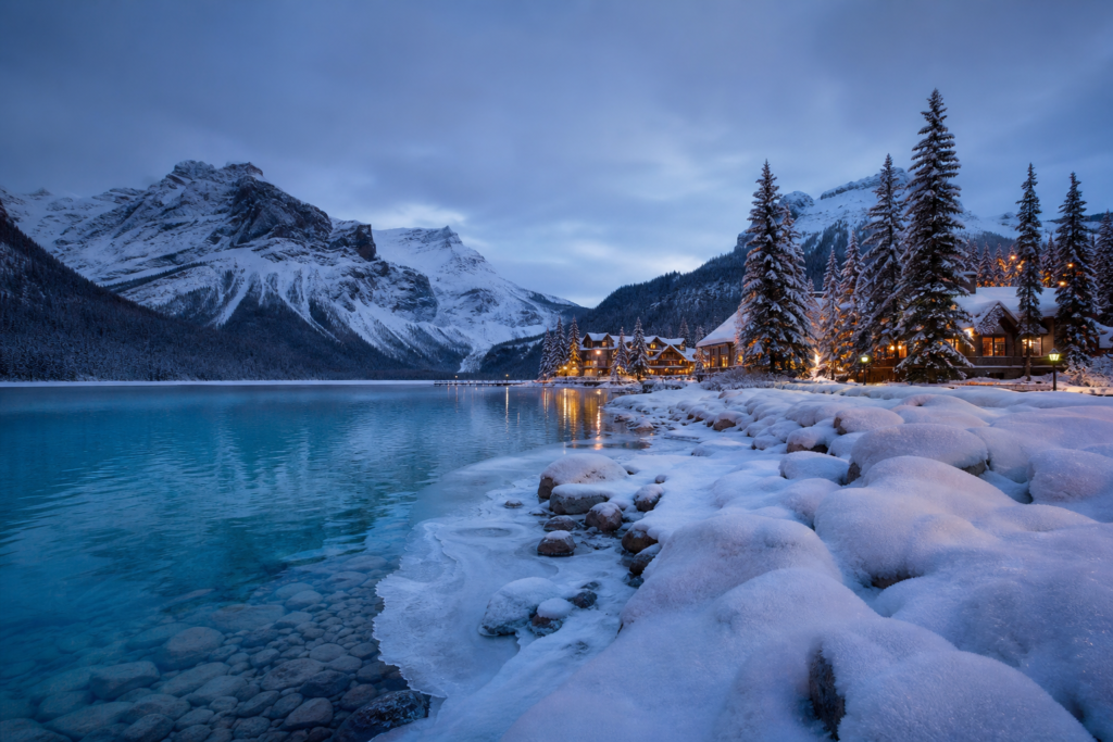 Cozy Banff winter village and snowy mountains in February